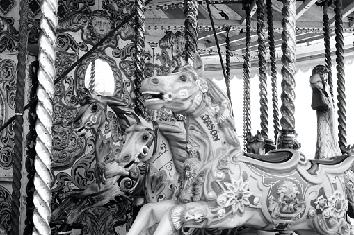 The fairground is empty as storms hit the East Sussex coast. The rides have had to stop due to the high winds and everything is still.