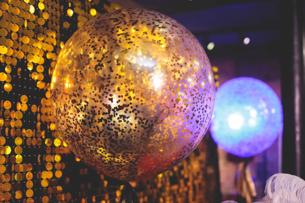 istock Decoration interior elements of restaurant venue banquet hall with multicoloured different helium balloons, on a indoor corporate event or wedding reception or birthday party celebration 1330098166