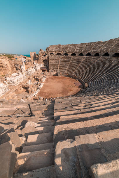 istock Ancient ruins and amphitheatre in Side Antalya, Turkey. 1330098462