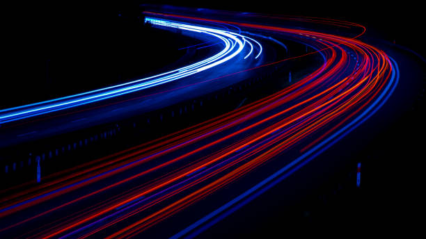 istock lights of cars with night. 1330100947