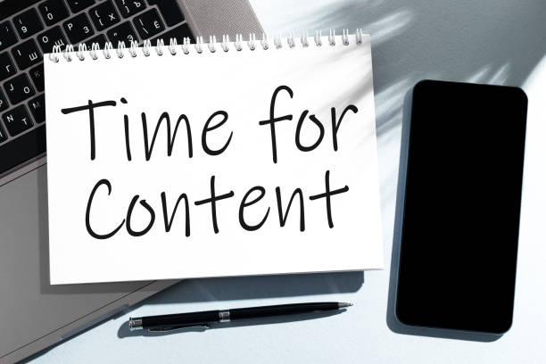 istock TIME FOR CONTENT on notebook, laptop, pen, cellphone. Business concept. Flat lay. 1330101658