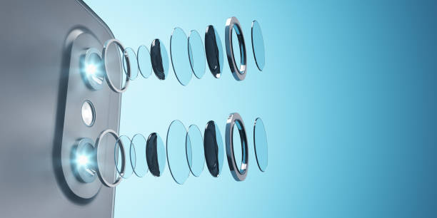 istock Decomposed smartphone camera lens on blue background with mock up place for your advertisement. Technology, mobile photography and progress concept. 3D Rendering. 1330103489