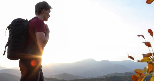 istock Young man hikes through mediterranean hillsides 1330107372