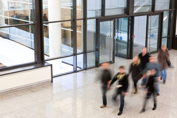 istock Group of People Walking Indoors, Social Issues 1330112288