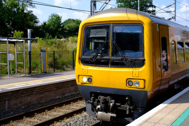 istock Generic Electrified railway line station in the English countryside. 1330114177