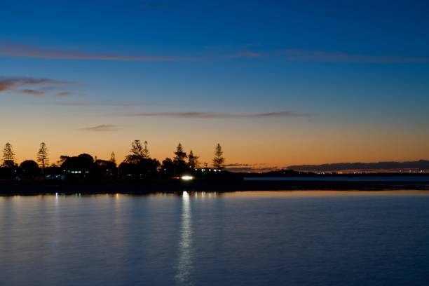 istock Searchlights at sunset, Manly, Queensland 1330115074