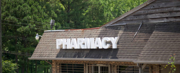 istock Pharmacy Sign on Building 1330116061