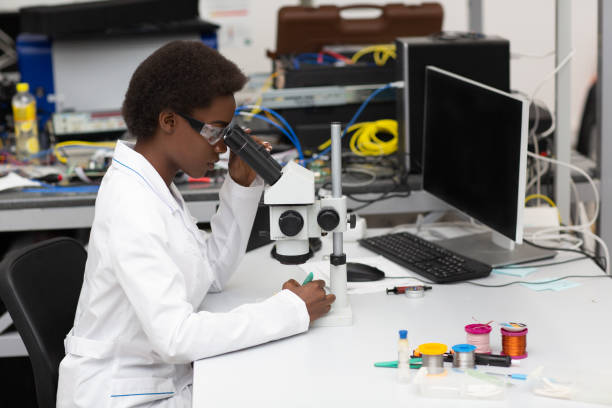istock Scientist african american woman working in laboratory with electronic instruments 1330120264