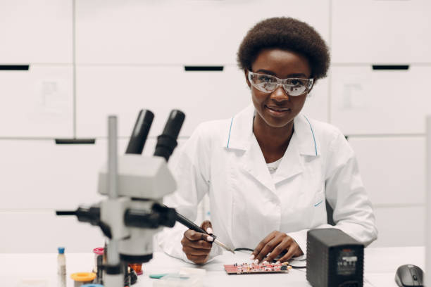 istock Scientist african american woman working in laboratory with electronic instruments 1330120271