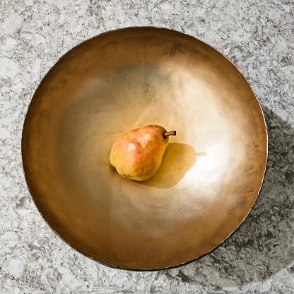 Autumn fruit still life with pears, apples and grapes on the grey background