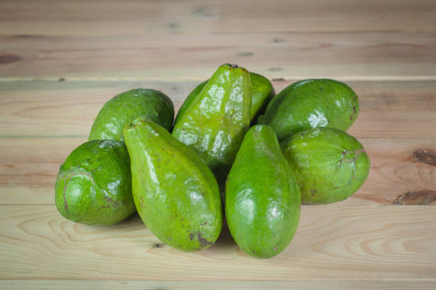 istock fresh avocado fruit on wooden table 1330126907