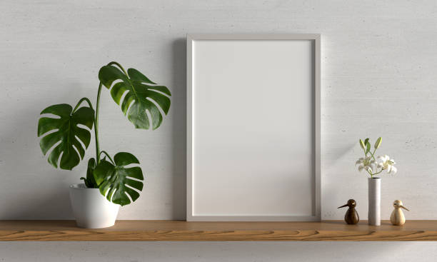 istock Monstera plant in vase with frame mockup, 3D rendering 1330127502