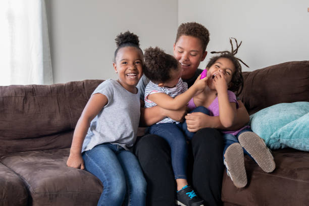 istock African American Siblings Playing 1330130027