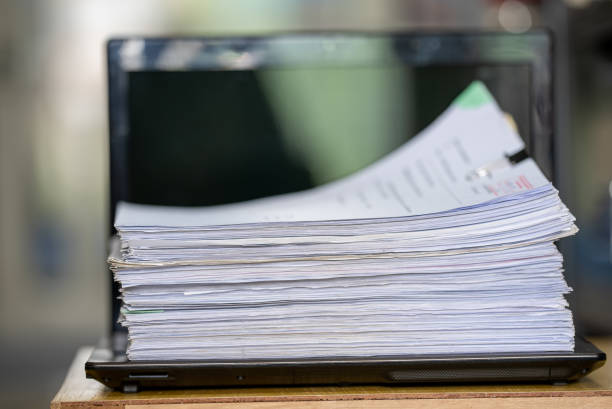 istock close up stacking of office working document Paperwork business with paper clip folder 1330130748