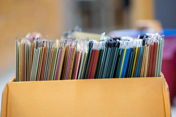 istock Paperwork business Document file Folders in brown box at office 1330130751