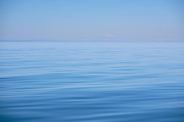 istock Mount Baker - barely visible in heat haze - over Salish Sea 1330132253