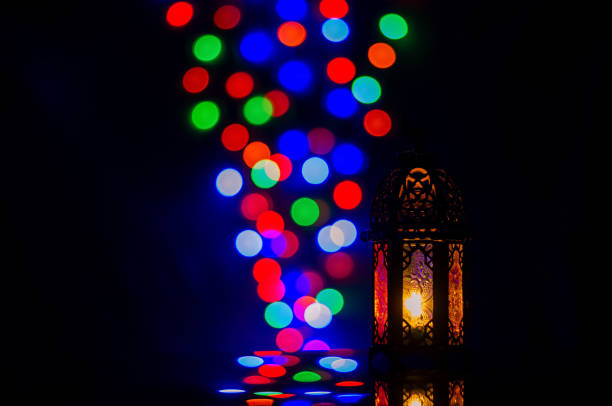 istock Lantern with colorful bokeh lights 1330147589