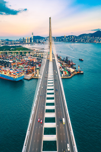 Drone view of Stonecutters Bridge and the Tsing sha highway at sunset