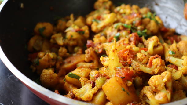 istock Aloo Gobhi an Indian Vegan recipe being cooked 1330150930