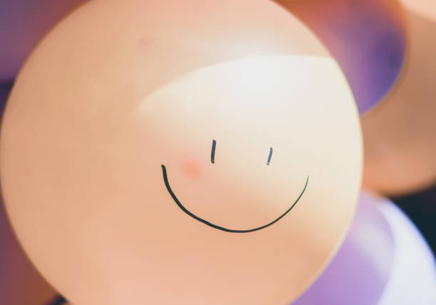 istock Emotions concept. depression faces on balloons 1330152615