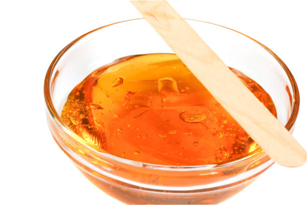 istock honey wax for hair removal on a white background 1330152668