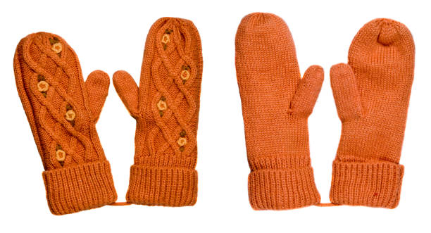 istock Mittens isolated on white background. Knitted mittens. Mittens top view.ginger mittens with pattern . 1330156610
