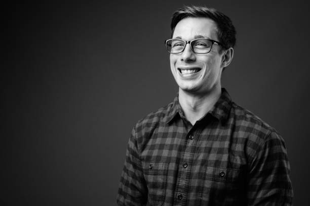 istock Young handsome hipster man in black and white 1330157221
