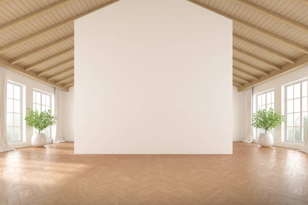 istock 3d rendering of empty minimal room with wooden laminate floor. Modern interior design with large plain white wall. 1330159523