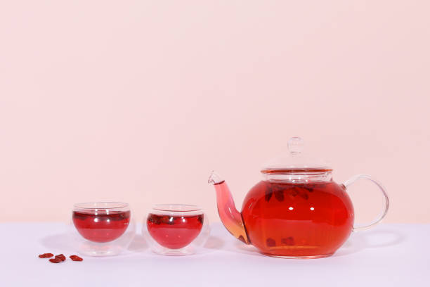 istock hot goji berry tea isolated in pink background 1330160438