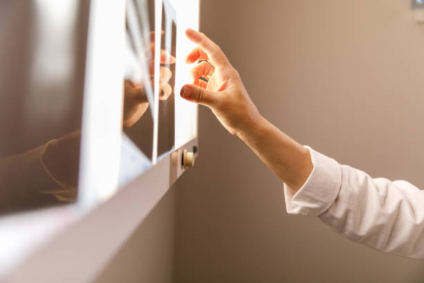 istock Hand of a female radiologist arranging scans on x-ray lightbox 1330161300