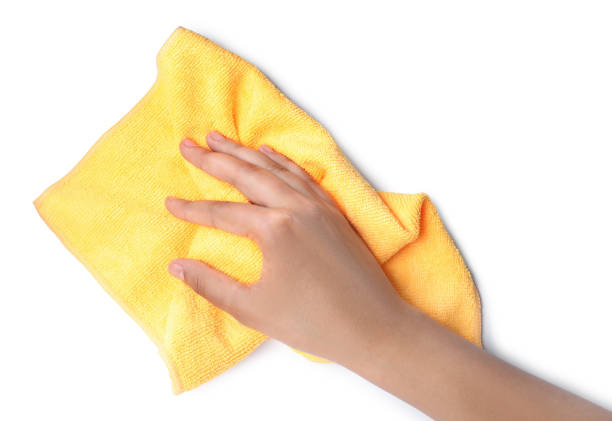 istock Woman with microfiber cloth on white background, closeup 1330162856