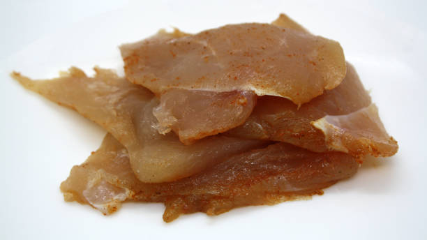 istock Chicken fillet pieces on a white plate. 1330167120