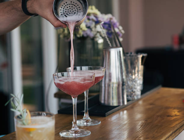 istock Pouring cocktail from shaker. 1330172795