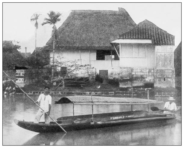 istock Antique black and white photograph: Boat with grass-mat canopy, Philippines 1330173089