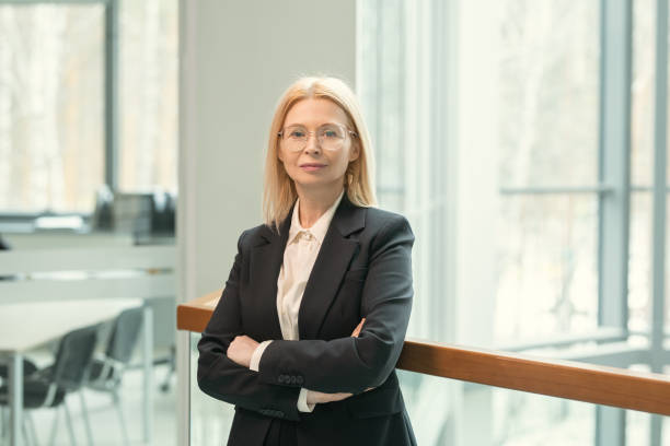 istock Confident businesswoman standing at office 1330178022