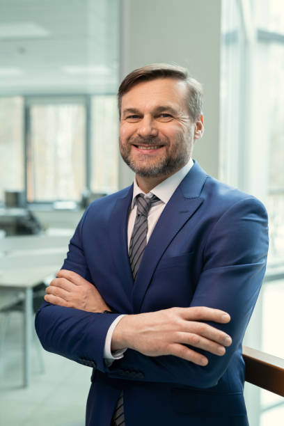 istock Successful businessman in suit at office 1330178023