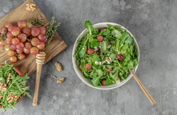 istock Roasted grapes, pecorino, walnut, and arugula salad. 1330182113