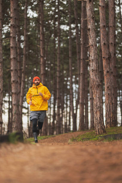 istock Man jogging in the park 1330190805