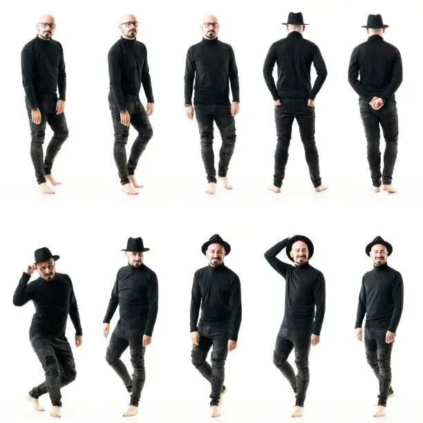Group of various stylish eccentric edgy artist males people posing in black clothes. Full body people isolated on white background