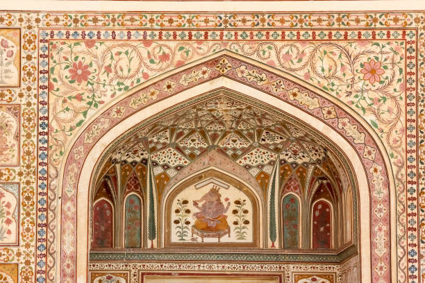 The ornate carvings on the arches of the ancient Amer fort The ornate carvings on the arches and entrance walls to the ancient Amer fort in the city of Jaipur in Rajasthan, India. amber fort stock pictures, royalty-free photos & images