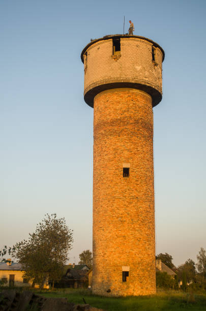 istock A man stands on an abandoned water tower 1330196158