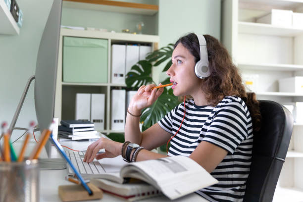 istock Young woman working from home 1330196186