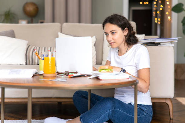 istock Young woman working at home 1330196409