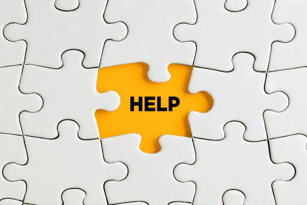 istock The word help on yellow missing puzzle piece. Support, assistance or guidance 1330197366