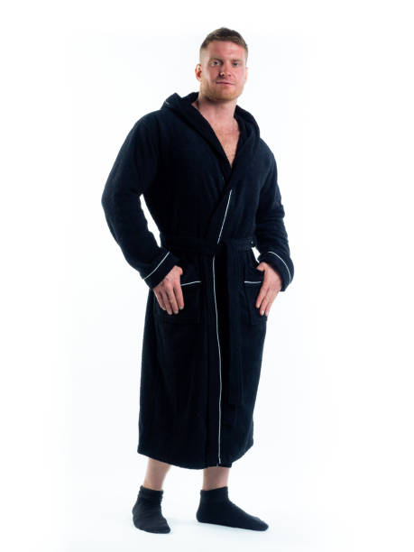 istock strong man in a Bathrobe on an isolated white background with a smile on his face. 1330199150