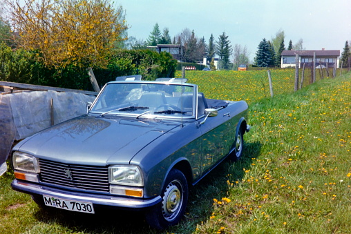 Bavaria, Germany – July 1990. This 304 S Cabriolet, built in 1975, was a success for Peugeot and was noted for several advanced features under its “Pininfarina“ styled exterior. The images were scanned from the 1990's original negative.