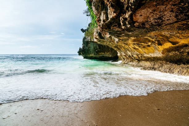 istock Bali, Sunset over Indian ocean. View through Suluban beach caves, 1330201175