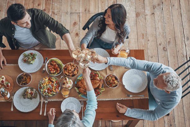 istock Top view of multi-generation family toasting 1330202088