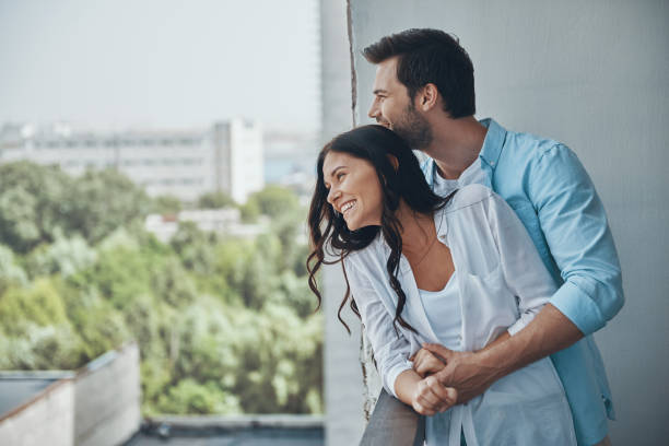 istock Beautiful young couple smiling and bonding 1330202233