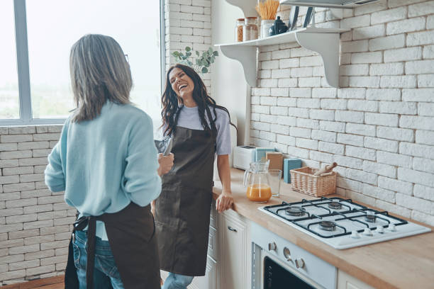 istock Beautiful young woman and her mother communicating 1330203227